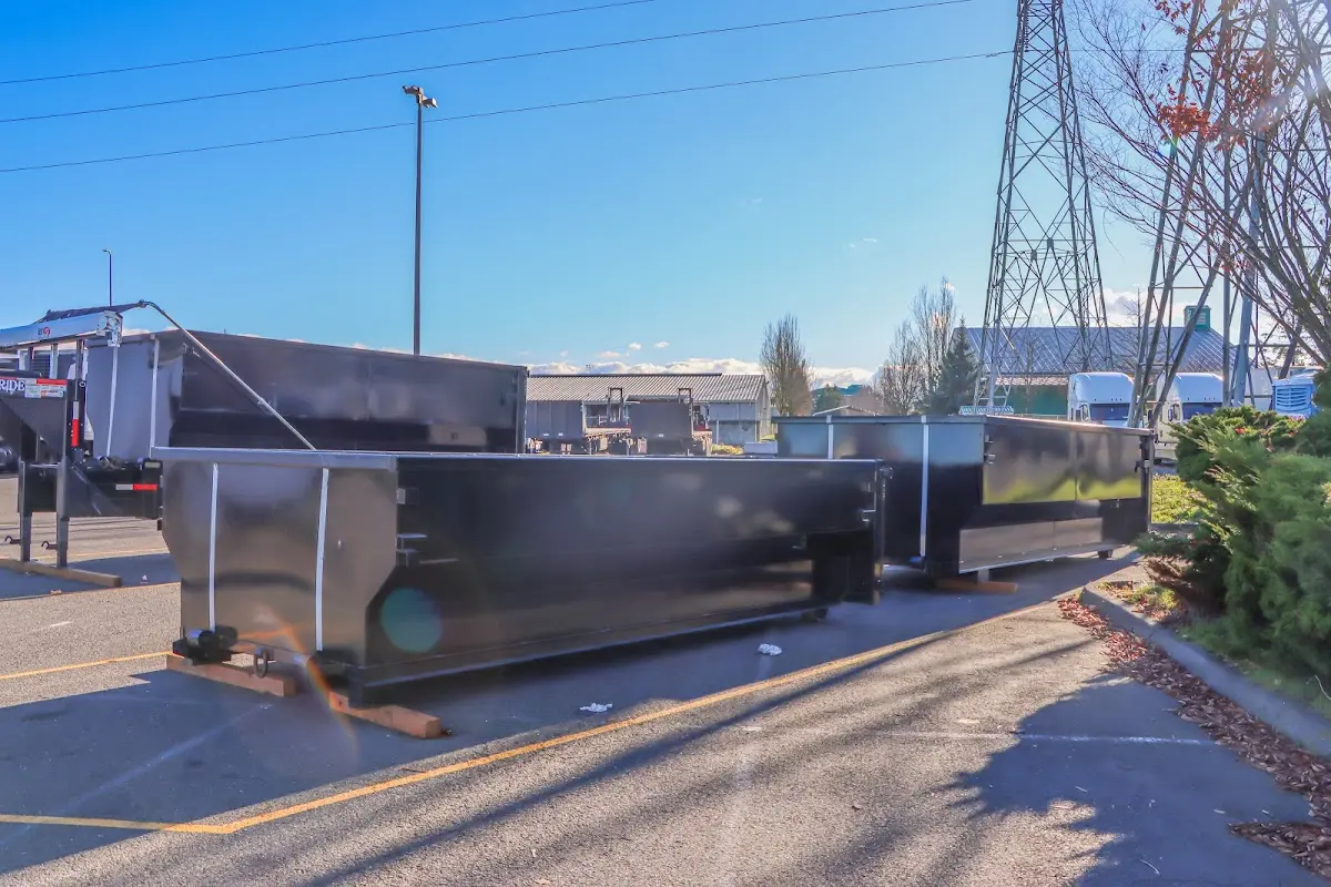 Roll-off dumpster ready for waste disposal at job site for Commercial Dumpster Rental in Chelsea